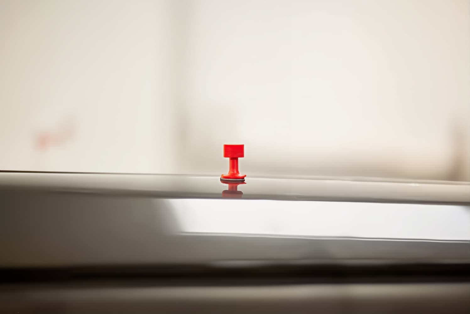 red magnet on car