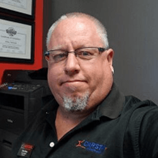 Brian Dean, the shop manager at Crystal CARSTAR Collision.